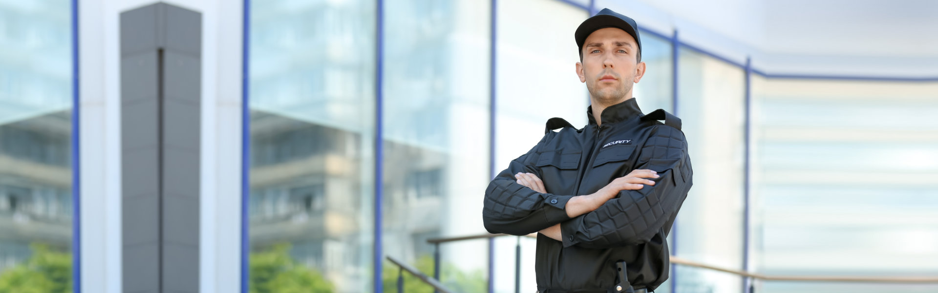 Portrait of male security guard in uniform outdoors