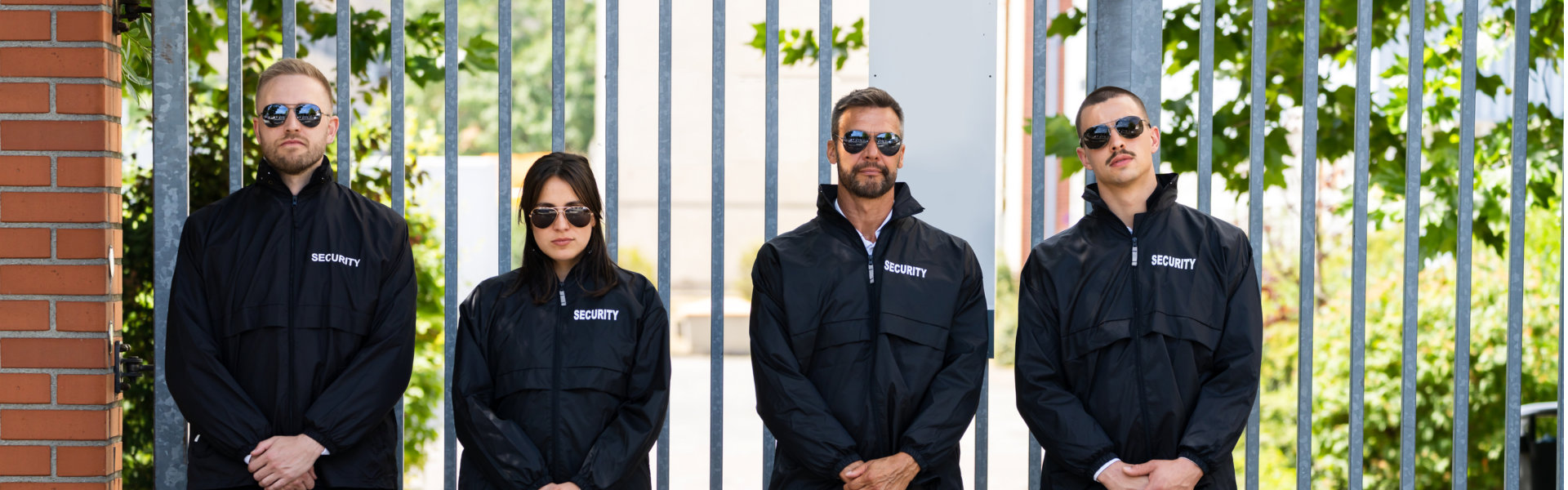 Group of securities standing outside the gate